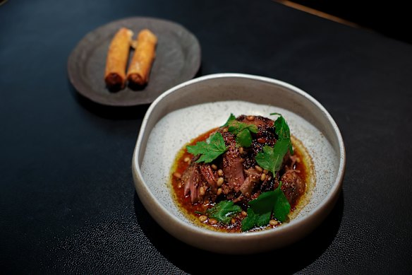 Twelve-hour roasted lamb shoulder served with crispy briwats, smoked eggplant, sticky lamb fat and lemony
za’atar jus.