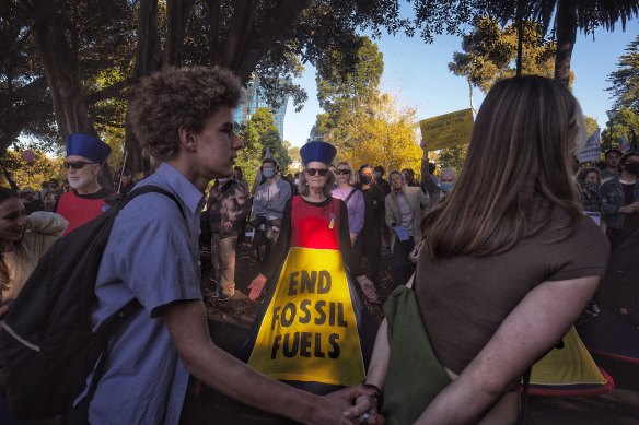 After listening to speeches, the crowd marched from Treasury Gardens into the city.