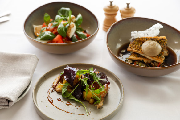Sea Level’s barbecued furikake Murray cod fillets, pork belly and caprese salad.