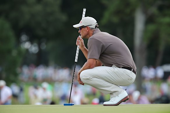 Adam Scott lines up a putt in his final round at East Lake.