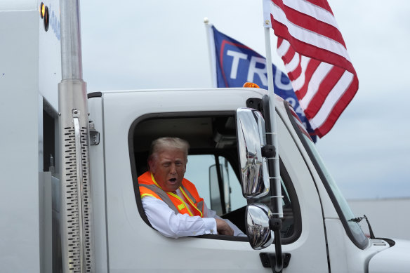 Trump climbed aboard a garbage truck in Wisconsin.