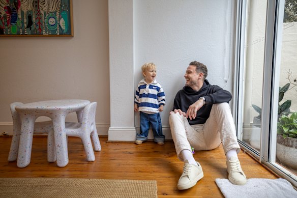 Hugo Toovey, a prostate and colorectal cancer survivor and continence health advocate, with two-year-old son Teddy.