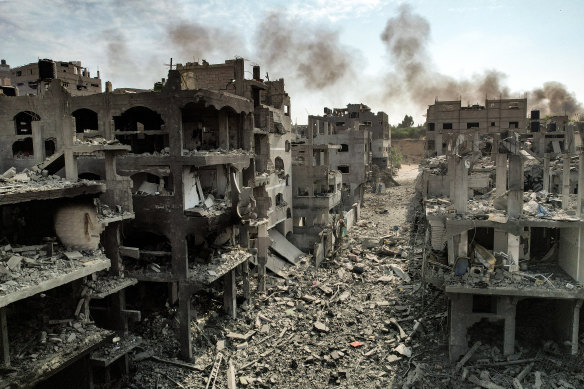 This picture taken on October 11, 2023 shows an aerial view of buildings destroyed by Israeli air strikes in the Jabalia camp for Palestinian refugees in Gaza City