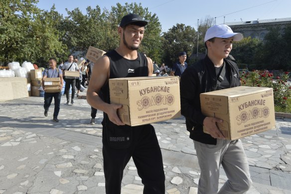 Volunteers collect food to send in support of people left homeless during the fighting near the Kyrgyz-Tajik border Bishkek, Kyrgyzstan on Saturday, September 17.