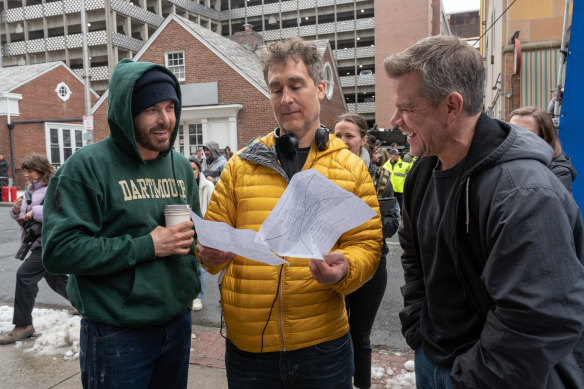 Casey Affleck (left) on the Boston set of The Instigators with director Doug Liman (middle) and Matt Damon.  