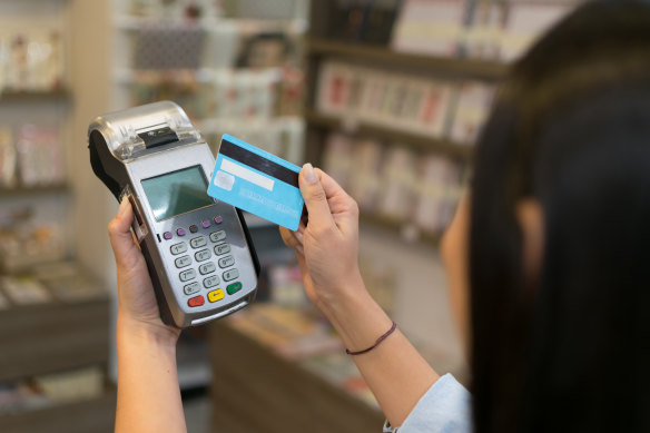 Small businesses are often forced to pass on the cost of the electronic payment system to shoppers.