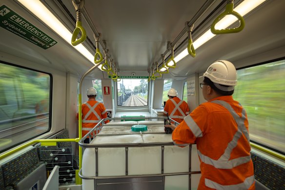 Metro staff oversee the trip from Bankstown to Marrickville on Tuesday.