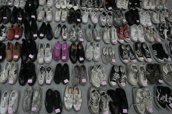 Hundreds of shoes were left behind in the alleyway in Itaewon. 
