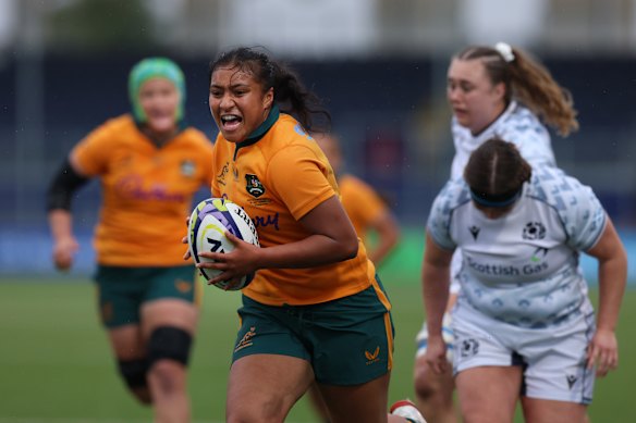 Faitala Moleka races away to score in the second half of the Wallaroos’ win over Scotland.