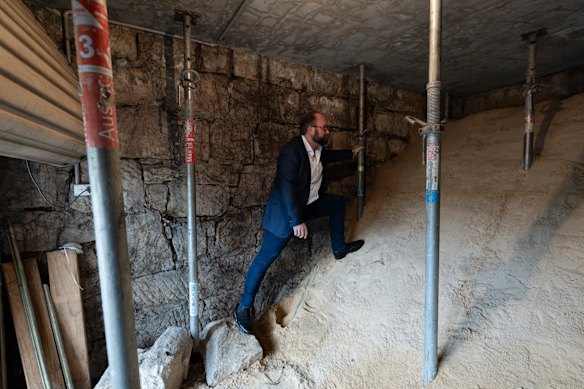 Hugh Woodgate in his garage, which is unusable after being damaged by construction next door on O’Sullivan Road in Bellevue Hill.