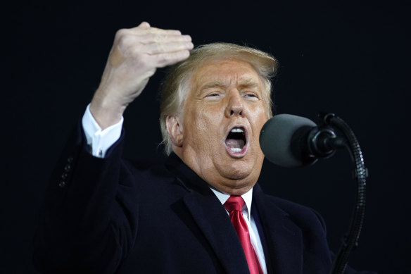 President Donald Trump speaks at a campaign rally in Iowa on Wednesday.