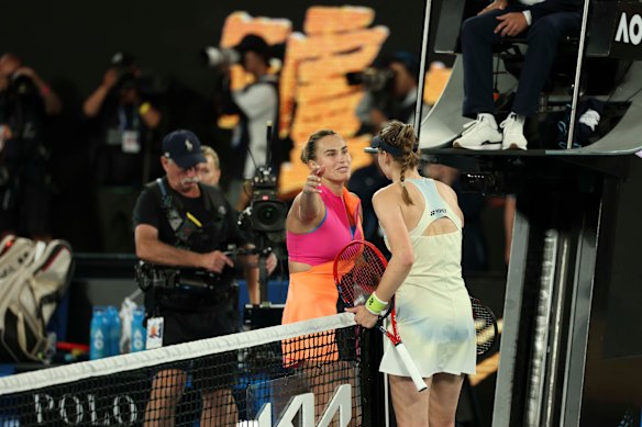 Aryna Sabalenka and Elena Rybakina hug following their Australian Open women’s final.