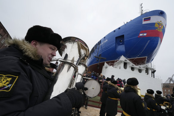 Naval band plays during a launching ceremony of nuclear-powered icebreaker Yakutia in St Petersburg.