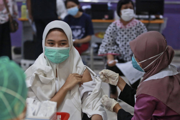 Indonesia is ramping up its vaccination program but does not yet have enough to innoculate its 270 million people. 
