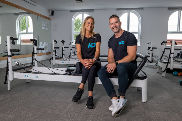 KX Pilates CEO Selina Bridges and founder Aaron Smith.