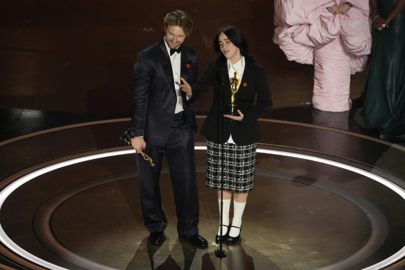 Finneas O’Connell, left, and Billie Eilish accept the award for best original song for What Was I Made For? from Barbie.