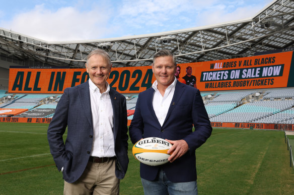 Wallabies coach Joe Schmidt and ex-Wallabies star Matt Burke pose during a Rugby Australia press call.