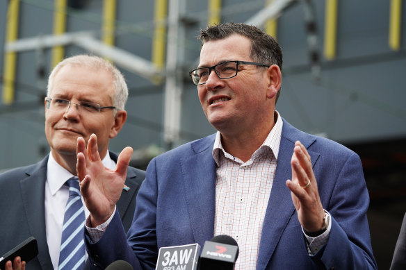 Prime Minister Scott Morrison and Victorian Premier Daniel Andrews speaking to media about the airport rail link at Sunshine train station last April. 