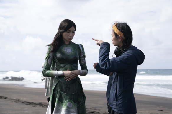 Eternals was visually stunning. But did director Chloe Zhao, right, with actress Gemma Chan, have to compromise?
