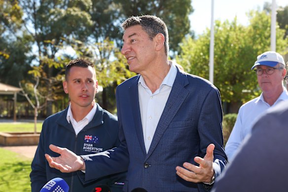 Liberal Leader Basil Zempilas and Ryan Robertson Liberal Candidate at Singleton Primary School polling booth. 