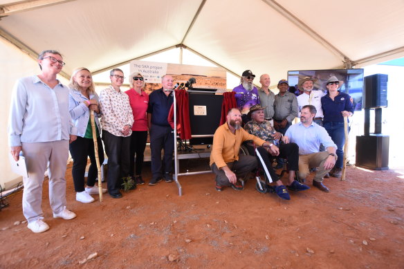 Square Kilometre Array Observatory delegates, Wajarri Yamaji traditional owners, and Federal Industry and Science Minister Ed Husic at the official start of construction of the SKA-Low in WA on Monday. 