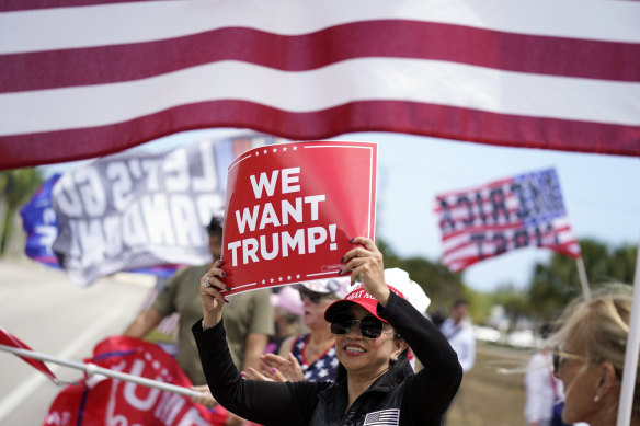 Supporters of Donald Trump outside the Trump International Golf Club in Florida.