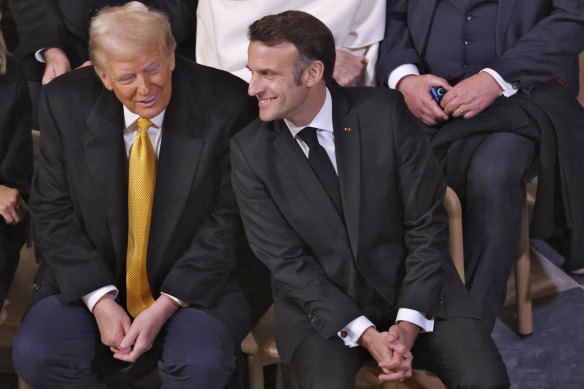 US President-elect Donald Trump with French President Emmanuel Macron in Notre-Dame Cathedral.