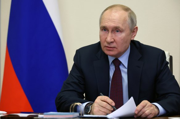 Russian President Vladimir Putin leads a cabinet meeting via videoconference at the Novo-Ogaryovo residence outside Moscow, Russia, on Wednesday.