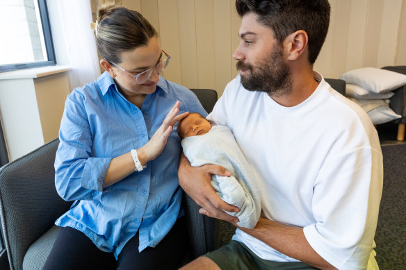 Kirsty and Nick Bryant with son Henry, the first baby born in Australia after a uterus transplant.