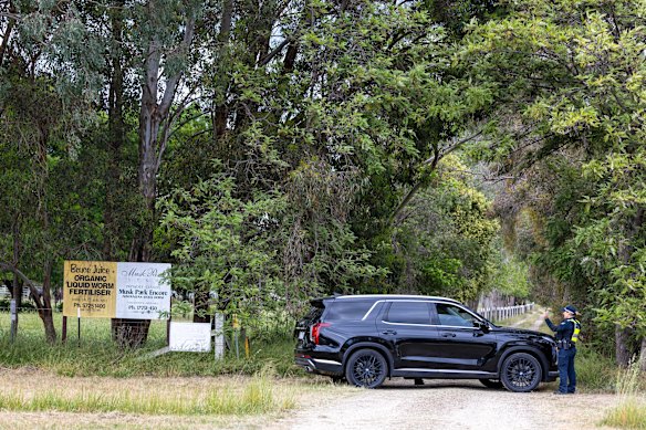 Police vehicles block the entrance to the address where it is believed 43-year-old Brendan Nugent lives. 