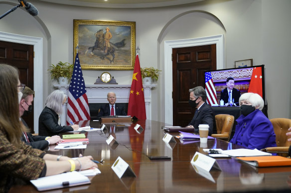 US President Joe Biden meets virtually with Chinese President Xi Jinping on Tuesday. 