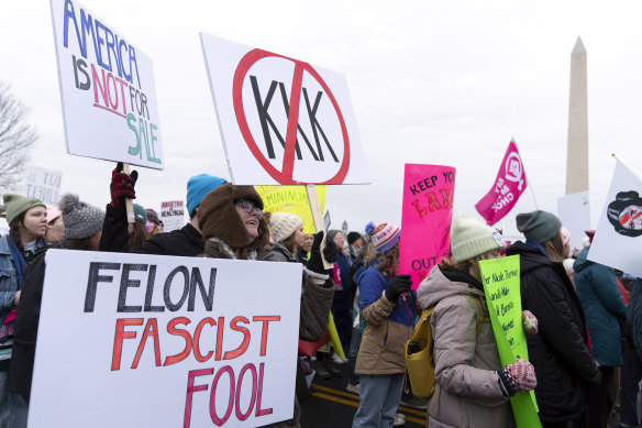 Demonstrators make their feelings clear ahead of Donald Trump’s return to the White House.