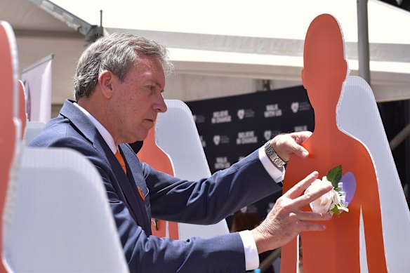 Police Minister Reece Whitby at a domestic violence rally. 