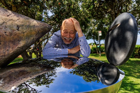 Sculptor Koichi Ishino with his work Circles.