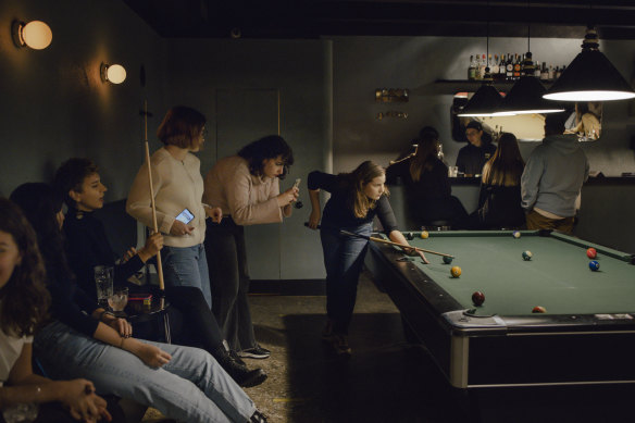 A game of billiards at a women’s social club in Moscow’s  trendy Stoleshnikov alley.