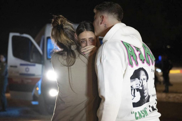 French-Israeli woman Mia Schem is greeted by her mother and brother at the Hatzerim Air Base on November 30.
