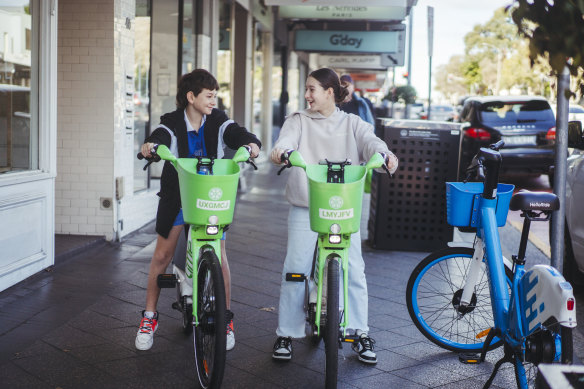 Siblings  Jack 10, and Sophie 12, using lime bikes to explore Sydney, in Oxford st in Paddington,  Wednesday 10th of July 2024. Photo: Dion Georgopoulos / The Sydney Morning Herald