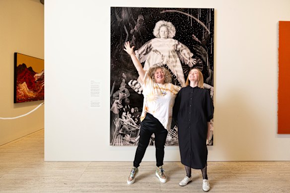 Archibald Prize winner Julie Fragar, right, and her subject Justene Williams.