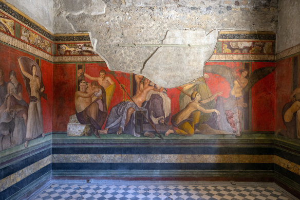 Frescoes inside the Villa of Mysteries, one of the best preserved houses at Pompeii, Italy.