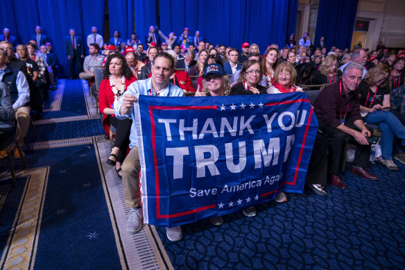 Trump supporters listen to his pitch at CPAC 2023. 