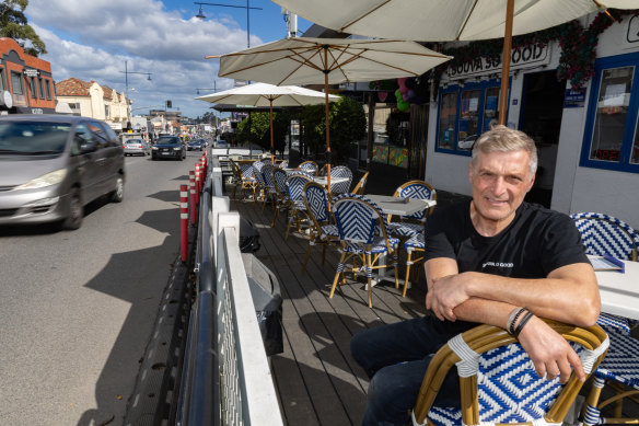 John Mihailidis is prepared to pay to keep parklets out the front of his building.