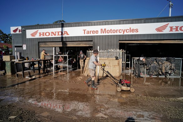 Taree businesses are cleaning up after the town was inundated by floodwater.