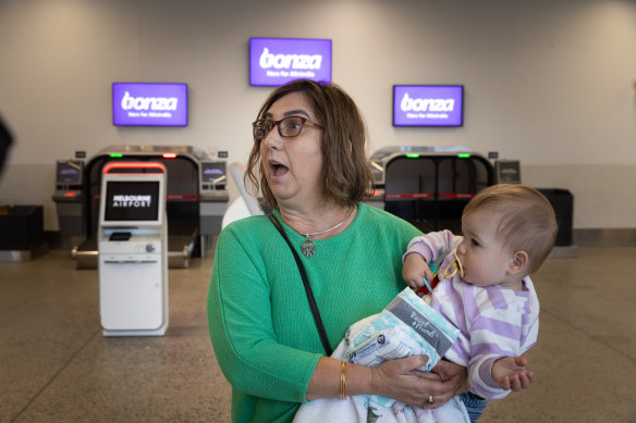 “Everything’s just been such a rush”: Allison Sigmund with granddaughter Elsie Harris at Melbourne Airport.