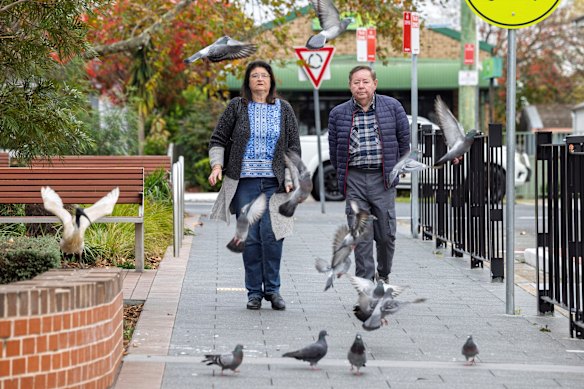 Councillors Helen Hughes and Paul Garrard at Dellwood shops in South Granville – one site where the council would like to cull pigeons.