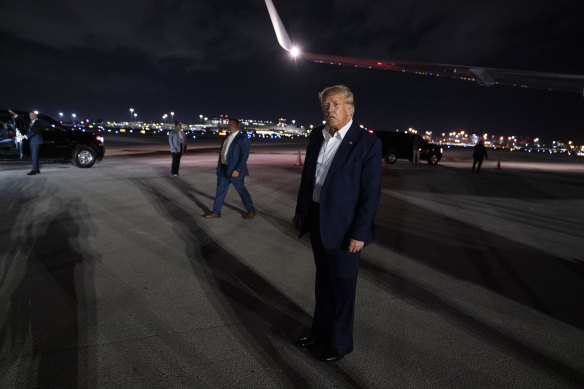 Donald Trump arrives at West Palm Beach Airport last weekend. 