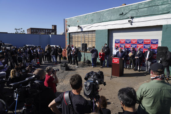 Beyond parody: The Trump administration's bizarre "Four Seasons" press conference in the car park of a landscaping company in industrial Philadelphia.