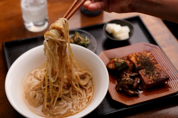 Sesame soy soup jjolmyeon (noodles in creamy savoury soup).
