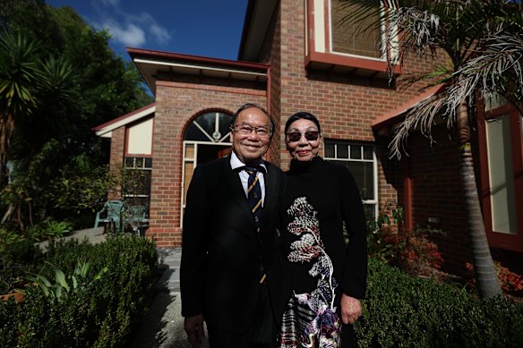 Dinh with his wife, Bach Yen Truong, at home in Melbourne.