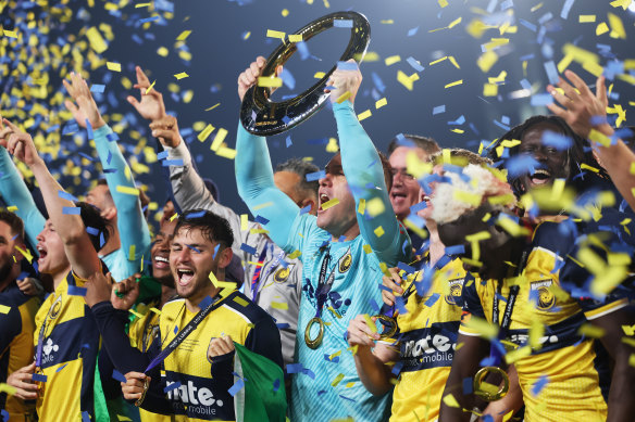 The Mariners celebrate their A-League Men grand final win earlier this year.