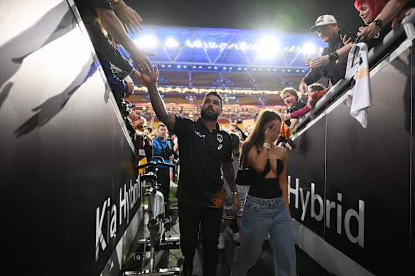 Adam Ryenolds leaves Suncorp Stadium on Thursday night. 